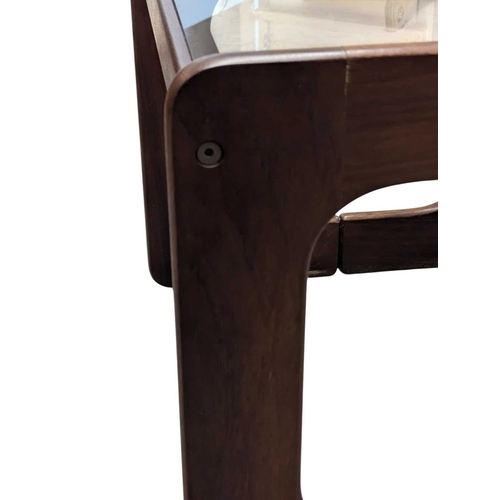 640 - British Modern Design - A vintage 20th century teak and smoked glass nest of tables. Rectangular for... 