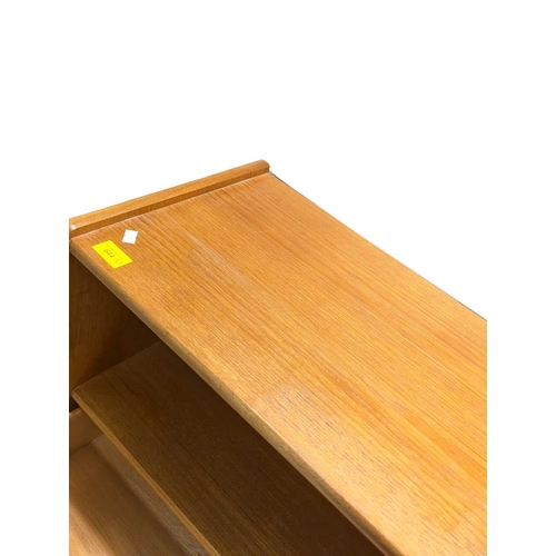 644 - Two Nathan (now Parker Knoll) teak bookcases, each having two central drawers adding to the appeal o... 