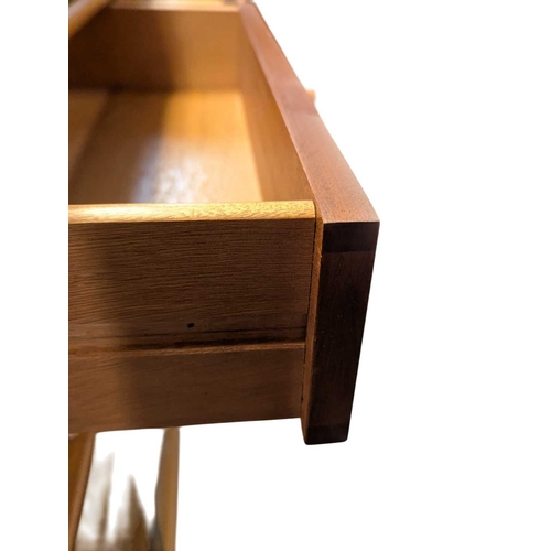 644 - Two Nathan (now Parker Knoll) teak bookcases, each having two central drawers adding to the appeal o... 