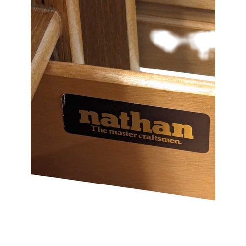 644 - Two Nathan (now Parker Knoll) teak bookcases, each having two central drawers adding to the appeal o... 