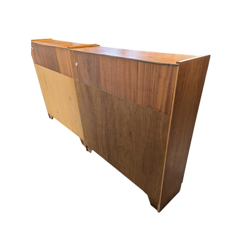 644 - Two Nathan (now Parker Knoll) teak bookcases, each having two central drawers adding to the appeal o... 