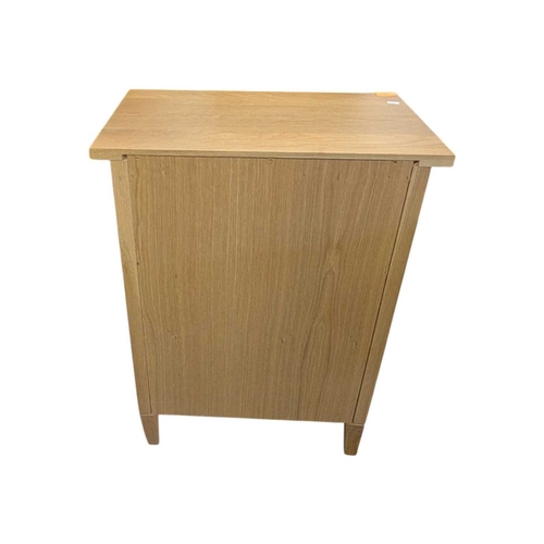 652 - A pair of contemporary oak bedside tables / side tables. Each having overhanging top with drawer ben... 