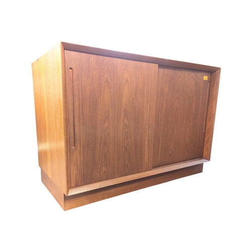 657 - Danish Modern Design - A mid 20th century circa 1960 Danish teak sidebaord. The sideboard having twi... 