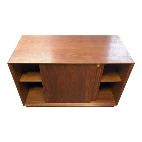657 - Danish Modern Design - A mid 20th century circa 1960 Danish teak sidebaord. The sideboard having twi... 