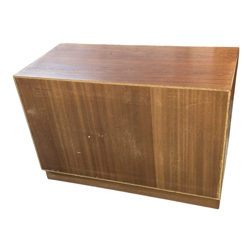 657 - Danish Modern Design - A mid 20th century circa 1960 Danish teak sidebaord. The sideboard having twi... 