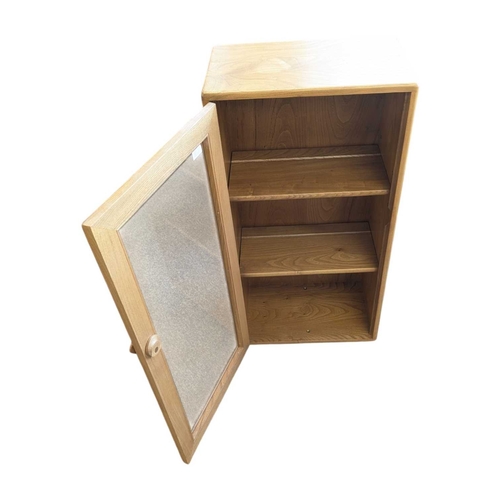 658 - Lucian Ercolani designed Ercol Windsor wall cabinet in solid elm having signature dovetail joints to... 