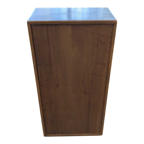 658 - Lucian Ercolani designed Ercol Windsor wall cabinet in solid elm having signature dovetail joints to... 