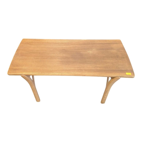 659 - Oak contemporary coffee table. Rectangular plank form with tapeing curved legs and supports with sma... 