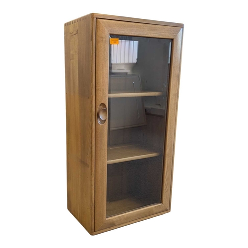 660 - Lucian Ercolani designed Ercol Windsor wall cabinet in solid elm having signature dovetail joints to... 