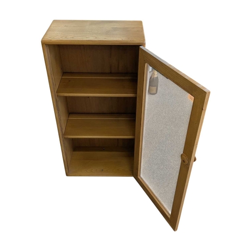 660 - Lucian Ercolani designed Ercol Windsor wall cabinet in solid elm having signature dovetail joints to... 