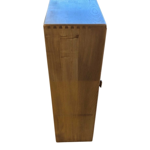 660 - Lucian Ercolani designed Ercol Windsor wall cabinet in solid elm having signature dovetail joints to... 