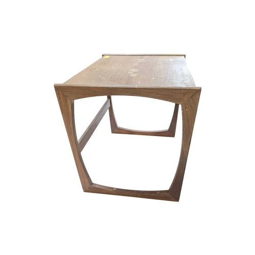 665 - G Plan Furniture - Mid century teak nest of tables. Rectangular form raised on quadrille supports wi... 