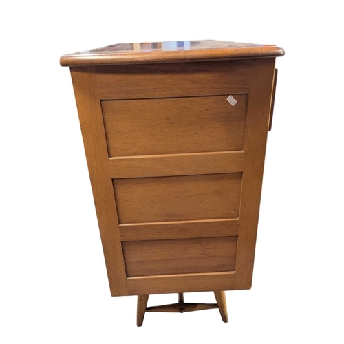 668 - Ercol Furniture - A retro mid century beech & elm sideboard credenza. Rectangular plank form wit... 