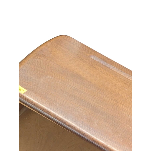 668 - Ercol Furniture - A retro mid century beech & elm sideboard credenza. Rectangular plank form wit... 