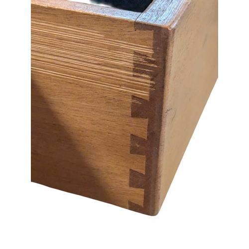 668 - Ercol Furniture - A retro mid century beech & elm sideboard credenza. Rectangular plank form wit... 