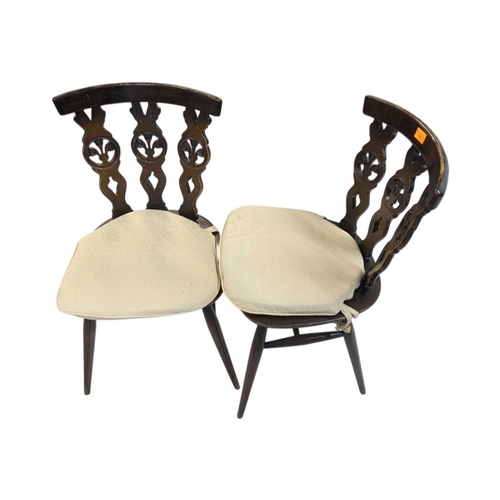 670 - Ercol - Set of four Fleur De Lys vintage 20th century elm dining chairs. Model number 375 on saddle ... 