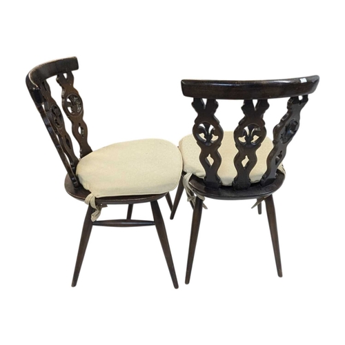 670 - Ercol - Set of four Fleur De Lys vintage 20th century elm dining chairs. Model number 375 on saddle ... 