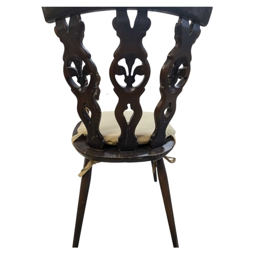 670 - Ercol - Set of four Fleur De Lys vintage 20th century elm dining chairs. Model number 375 on saddle ... 