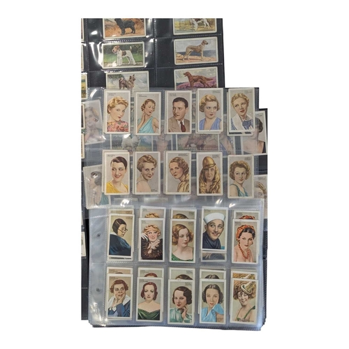 544 - A collection of 20th century cigarette cards. The collection including examples from Wills and Galla... 