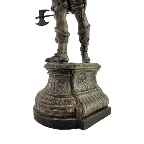 134 - A 19th century Grand Tour spelter figurine of a Spanish conquistador. Raised on an ebonised wooden s... 