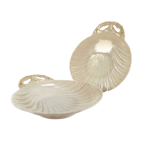 135 - A 20th century Irish Belleek lustre porcelain part tea service in the twisted shell shape. The servi... 