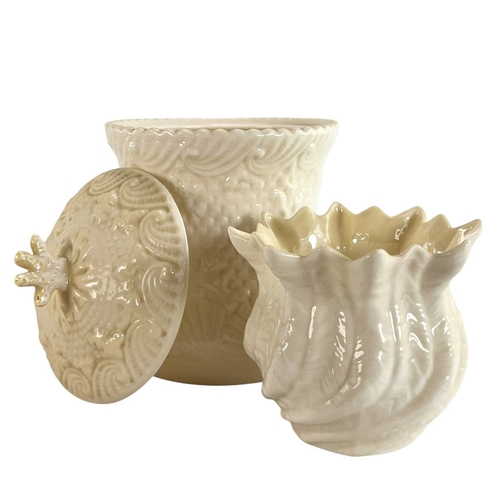 135 - A 20th century Irish Belleek lustre porcelain part tea service in the twisted shell shape. The servi... 