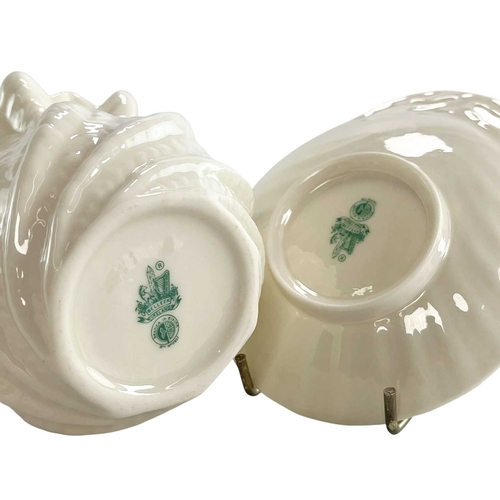 135 - A 20th century Irish Belleek lustre porcelain part tea service in the twisted shell shape. The servi... 