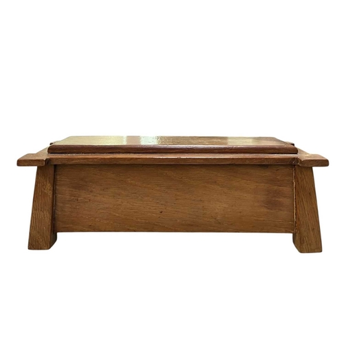 139 - An Arts & Crafts early 20th century walnut jewellery casket box in the form of a coffer chest. A... 