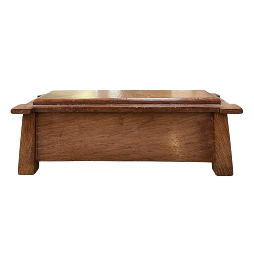 139 - An Arts & Crafts early 20th century walnut jewellery casket box in the form of a coffer chest. A... 