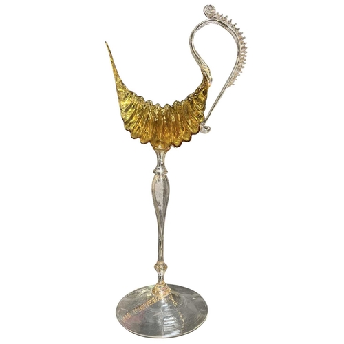 161 - A 19th century Italian Venetian hand-blown glass chalice glass. The gold glass depicts a decorative ... 