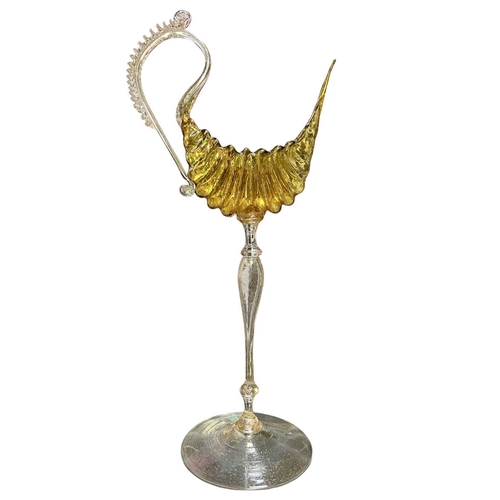 161 - A 19th century Italian Venetian hand-blown glass chalice glass. The gold glass depicts a decorative ... 