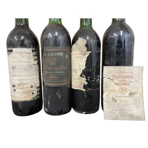 178 - A collection of four vintage 1980s French red wine bottles. The lot to include a Château Lagrange Mo... 