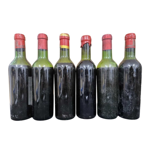 183 - A collection of six French vintage red wine half bottles from the regions of Pauillac, St. Emilion, ... 