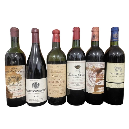 184 - An assortment of six vintage French red wine bottles from the regions of Pauillac, Bordeaux and Gevr... 