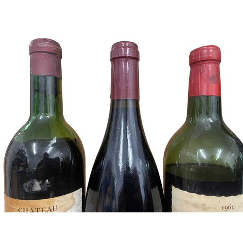 184 - An assortment of six vintage French red wine bottles from the regions of Pauillac, Bordeaux and Gevr... 