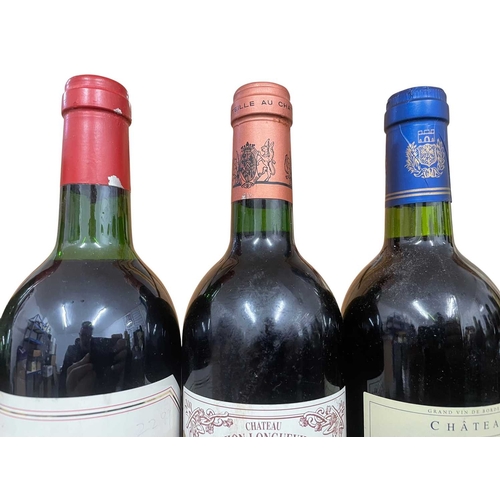 184 - An assortment of six vintage French red wine bottles from the regions of Pauillac, Bordeaux and Gevr... 