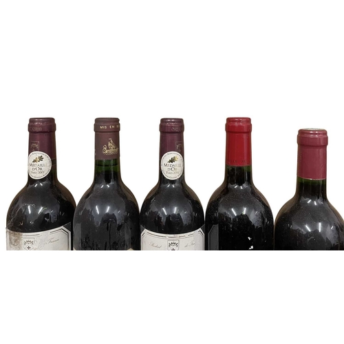 188 - A collection of ten vintage 1980s and 1990s French red wine bottles. The lot to include a Grand Vin ... 