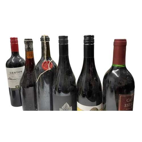 190 - A collection of sixteen Australian, Argentinian, New Zealand, USA and Continental red wine bottles. ... 