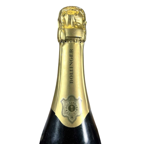 196 - A vintage Bollinger 1985 brut Champagne Grande Année bottle. 75cl, 12% vol. With label to Her Majest... 