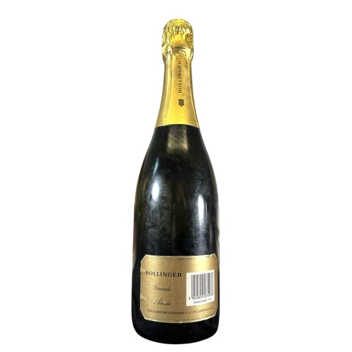 196 - A vintage Bollinger 1985 brut Champagne Grande Année bottle. 75cl, 12% vol. With label to Her Majest... 