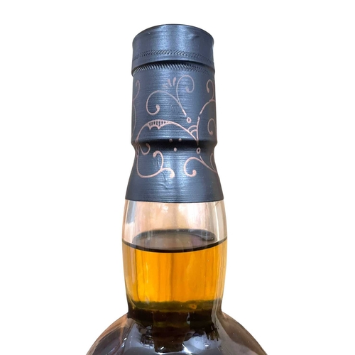 214 - A 1977, bottled in 1991, Knockando pure single malt Scotch whisky bottle in original box. Distilled ... 