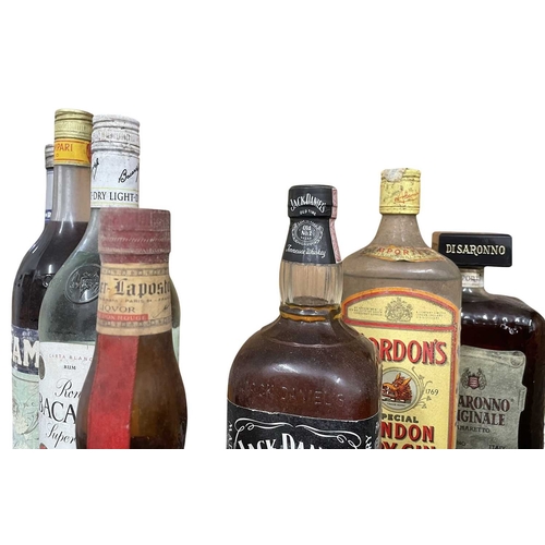 221 - A collection of eight vintage and later bottles of spirits and liqueurs. The lot to inclue a bottle ... 