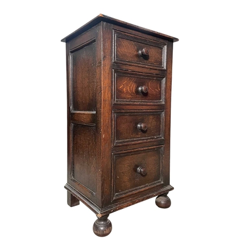 545 - A 19th century carved oak wood pedestal chest of drawers. The chest having an upright body with a ba... 
