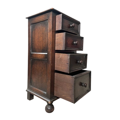 545 - A 19th century carved oak wood pedestal chest of drawers. The chest having an upright body with a ba... 