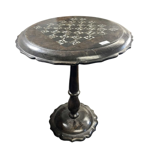633 - A Victorian 19th century papier-mache and abalone inlaid titl top side table. The table having a rai... 