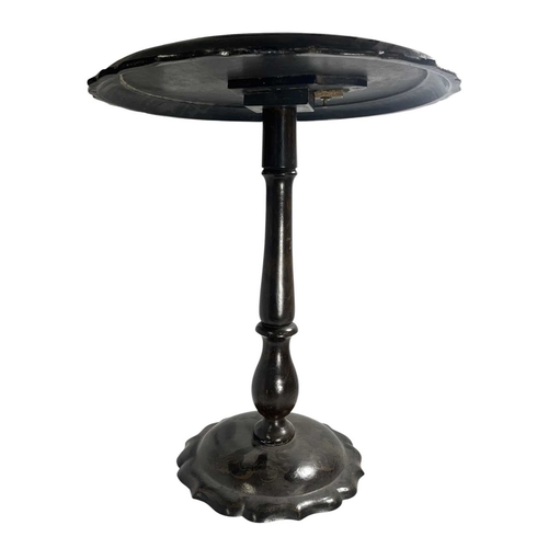 633 - A Victorian 19th century papier-mache and abalone inlaid titl top side table. The table having a rai... 